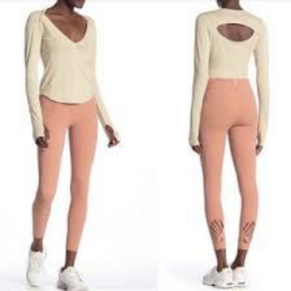 Small Free People Movement muted pink or orange tone Leggings